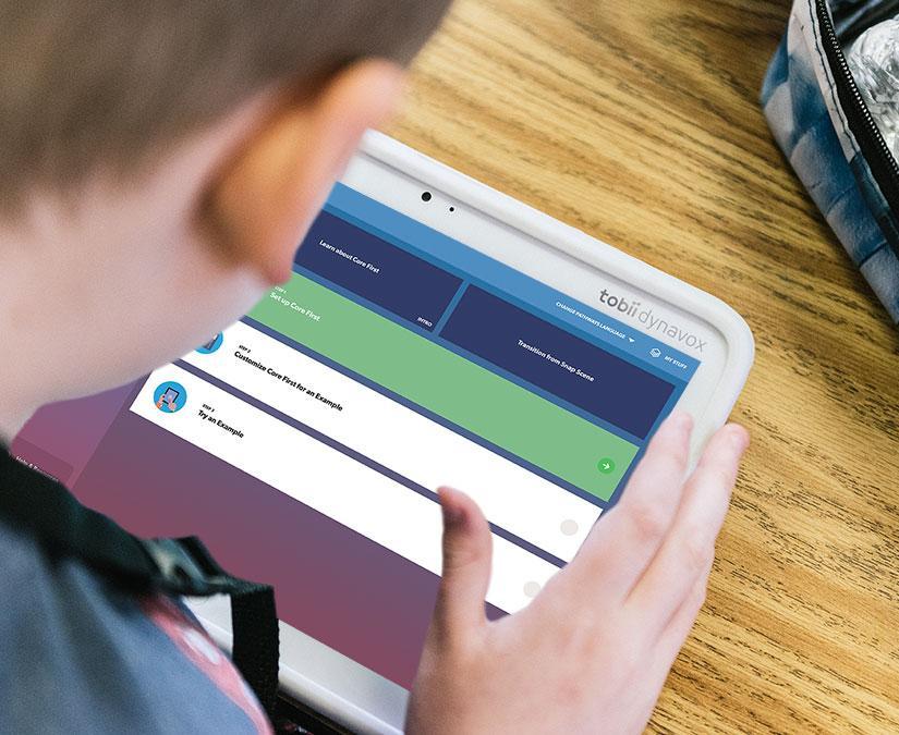 Boy with Speech generating device usingTobii Dynavox Pathways for Core First.