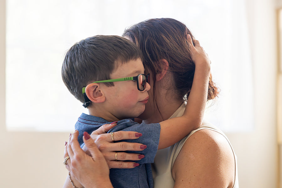 young boy with Autism palsy with his mother