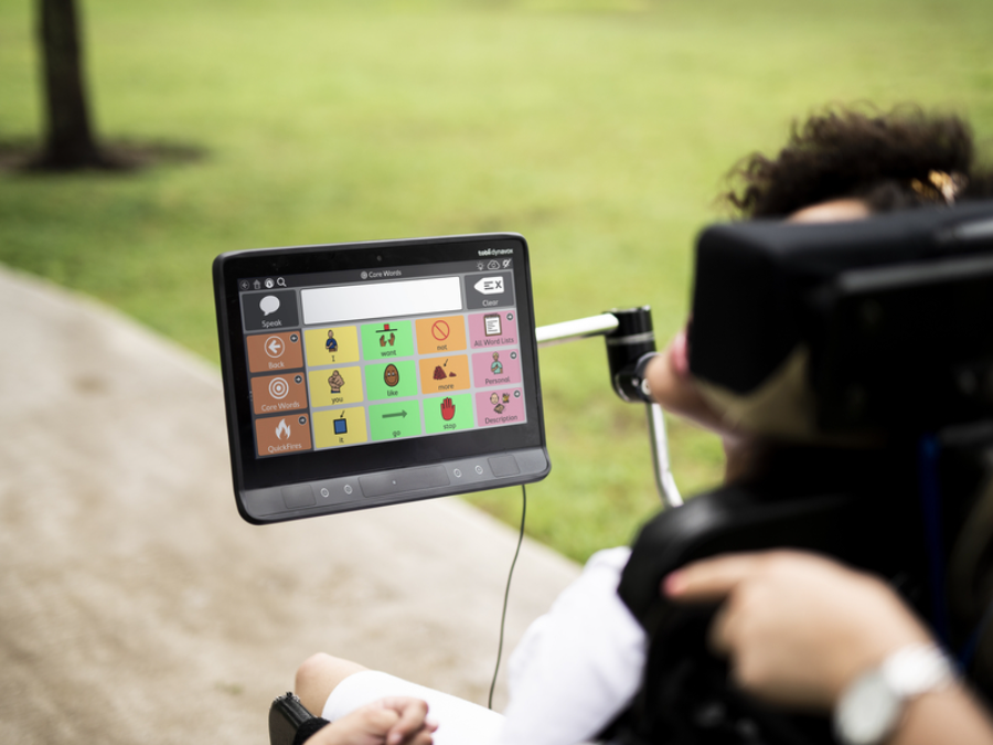 Young woman using TD Snap Core First on a Tobii Dynavox communication aid